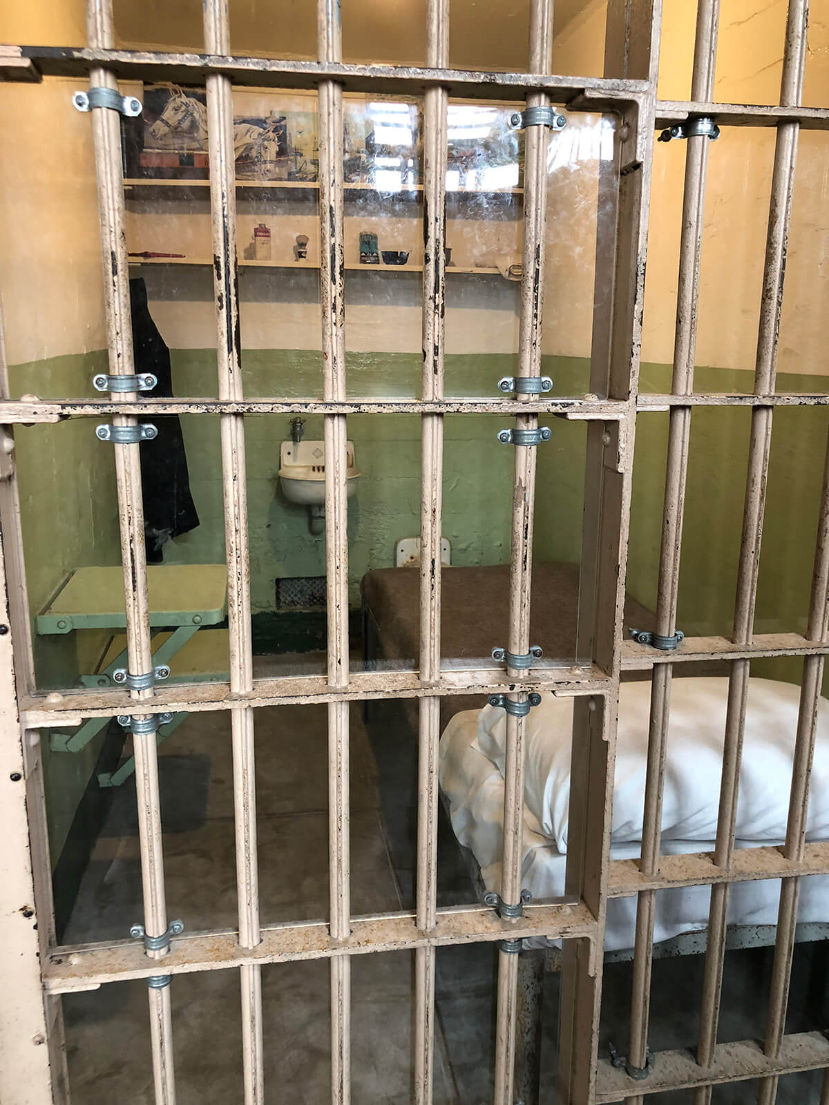 Barred entranced to the a cell in the Alcatraz prison