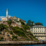 A beautiful scene of a building in Alcatraz Island, USA with a blue sky