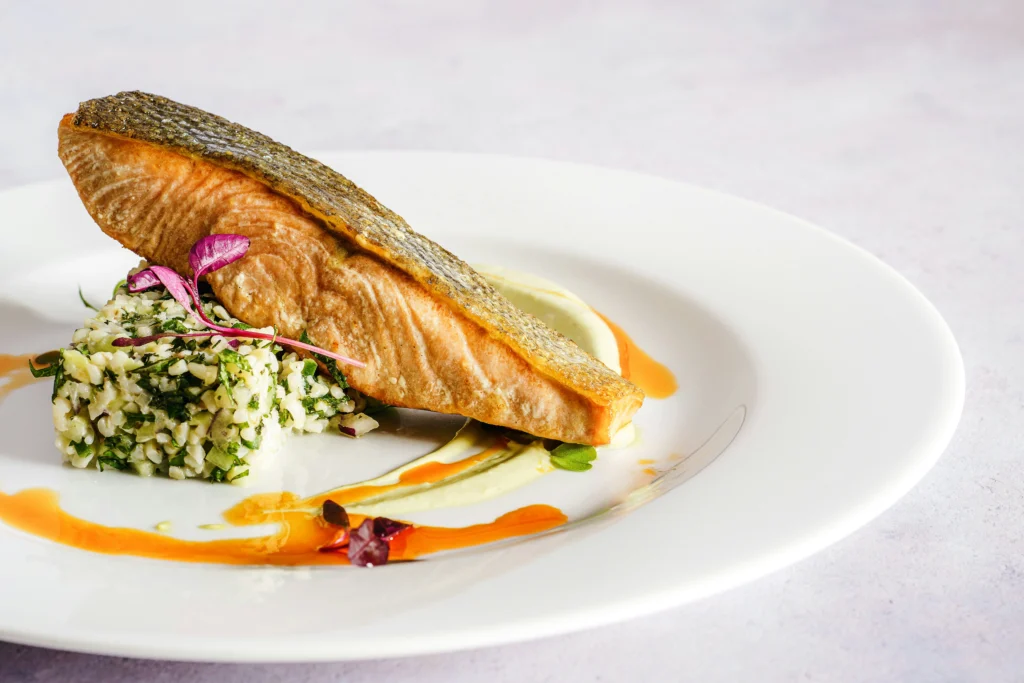 Salmon dish on white plate